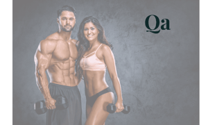 Healthy looking male and female couple holding dumbbells